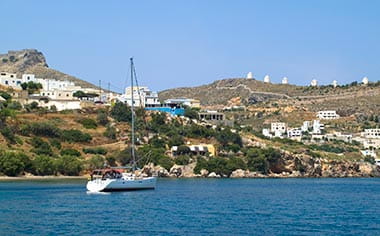 A boat sailing past the Greek island of Leros